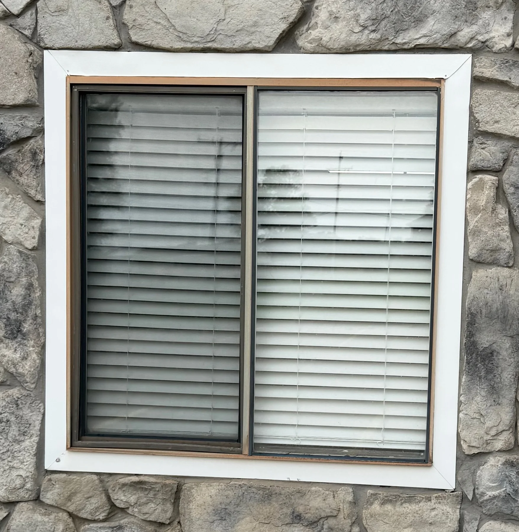 Weathered church window scheduled for replacement