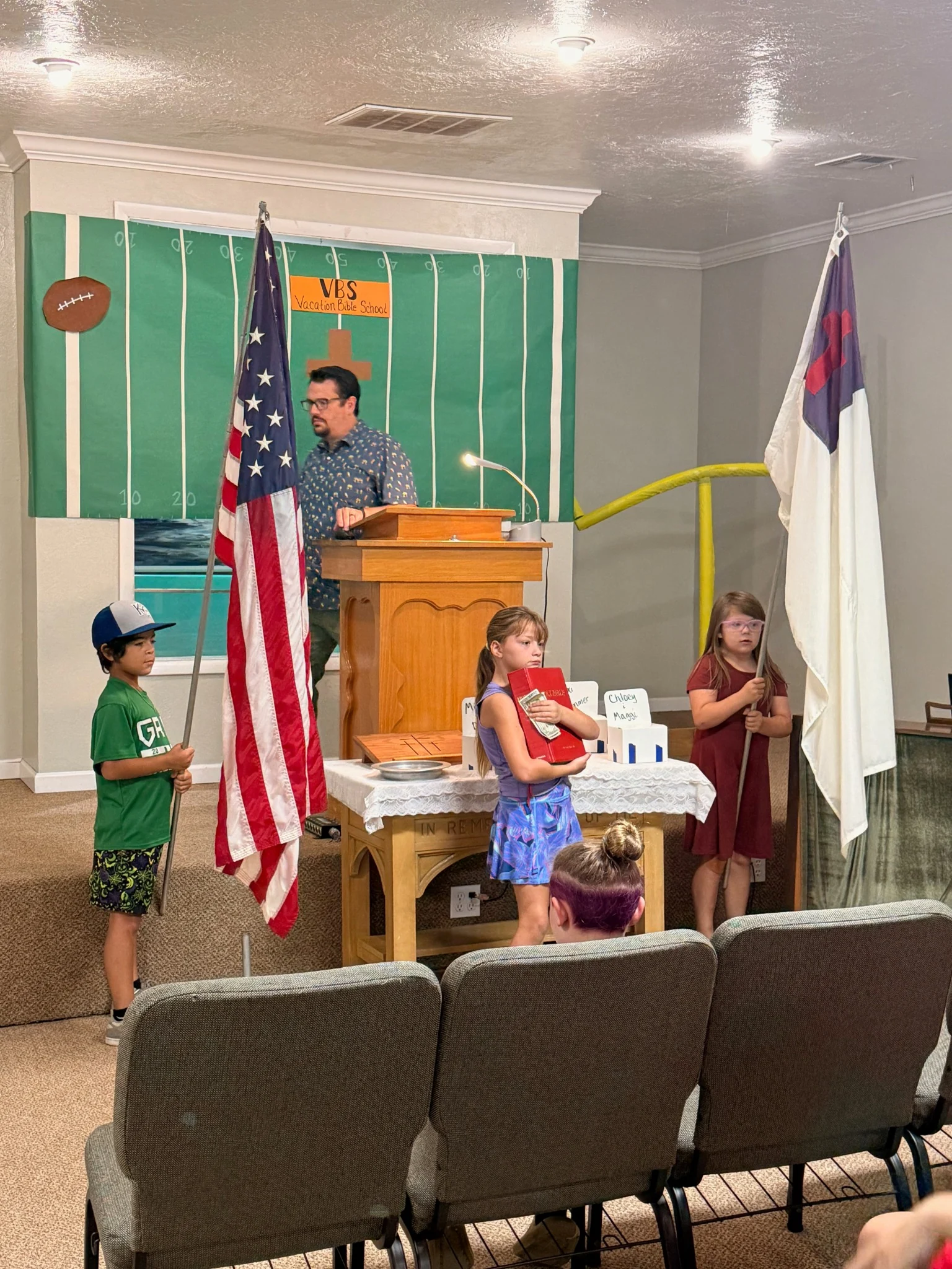 Children participating in the opening ceremony during Vacation Bible School